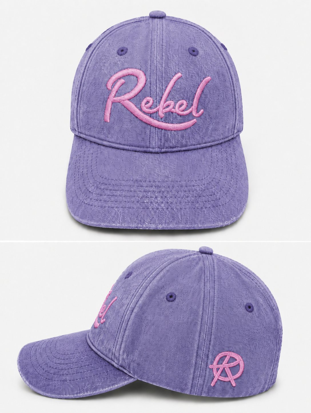 A purple washed cotton baseball cap shown from the front and side angles against a light gray background. The front features the word 'Rebel' embroidered in pink script, and the side displays a small Anarchy inspired embroidered 'R' logo.