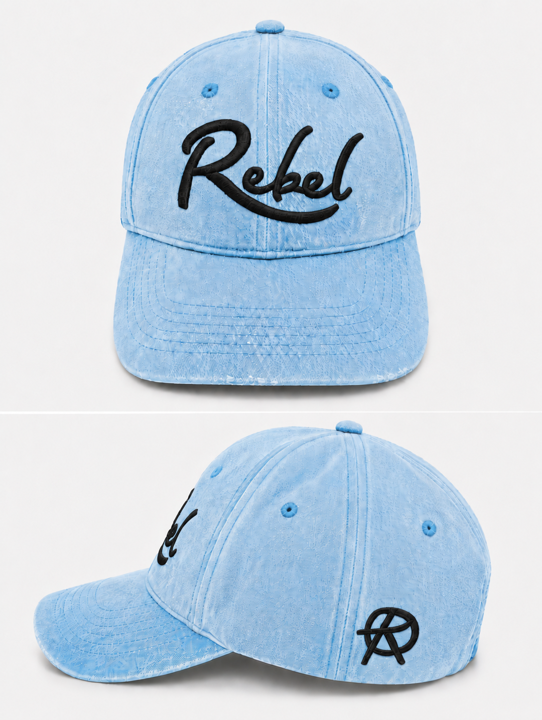 A light blue washed cotton baseball cap shown from the front and side angles against a light gray background. The front features the word 'Rebel' embroidered in black script, and the side displays a small Anarchy inspired embroidered 'R' logo.