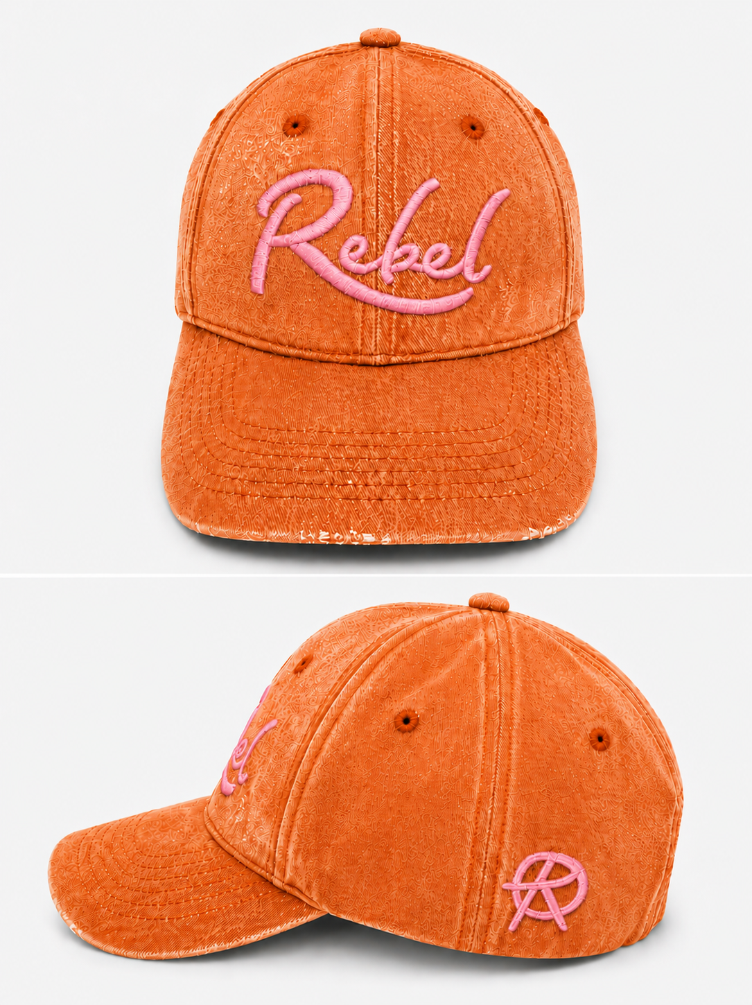 An orange washed cotton baseball cap shown from the front and side angles against a light gray background. The front features the word 'Rebel' embroidered in pink script, and the side displays a small Anarchy inspired embroidered 'R' logo.